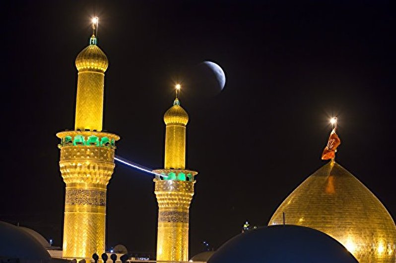 Beautiful image of the dome and two minarets of Imam Hussein shrine